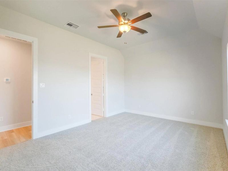 Spacious, unfurnished interior of a new home in Sunterra, Katy (Image 34).