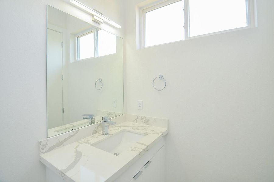 Bathroom (Sample photo from similar floor plan built by the builder)