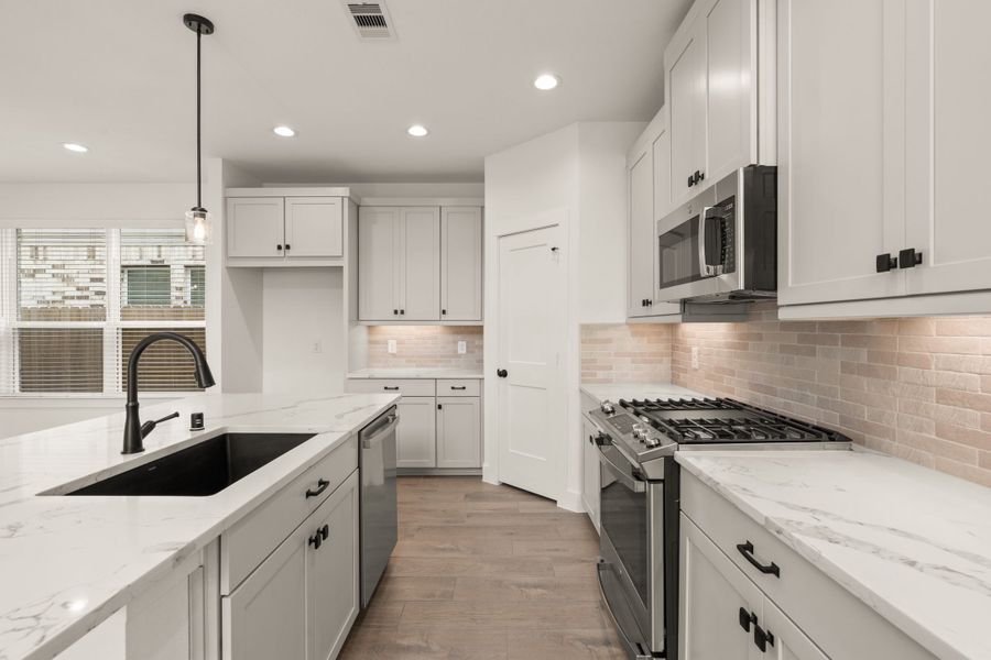 Furnished interior view inside a new home in The Woodlands Hills, Willis (Image 5).