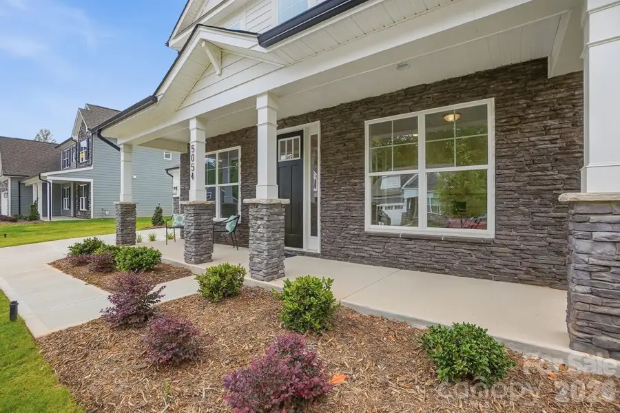 Homesite 96 features a Colfax L floorplan