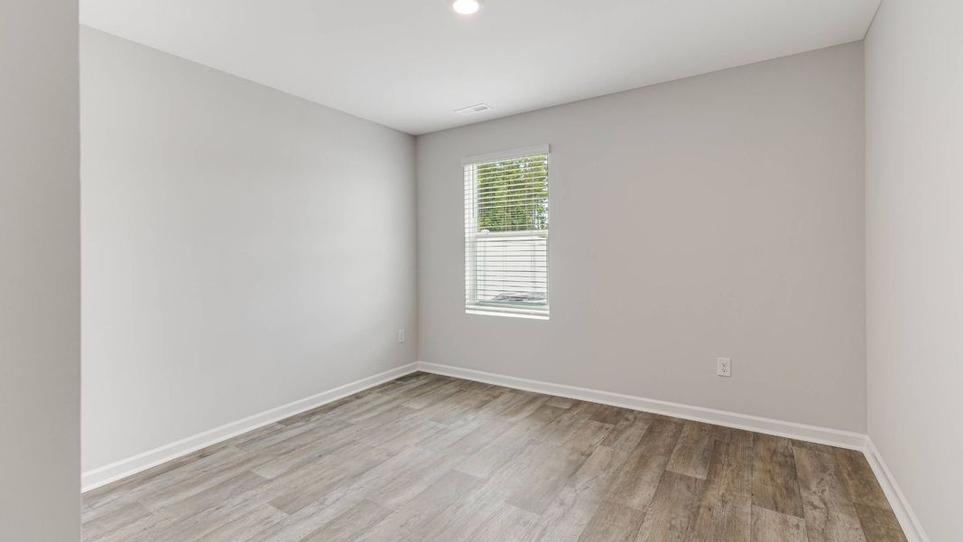 Representative unfurnished interior of a home built from the HAYDEN by D.R. Horton in Saltgrass Landing, Winnabow (Image 20).