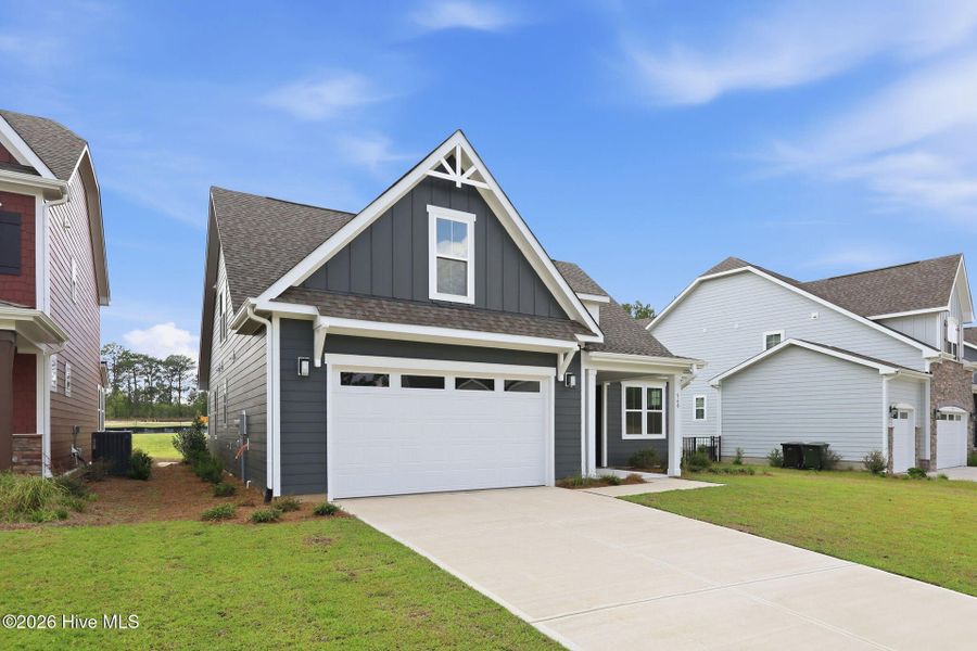 Front exterior of a new home in Legacy Lakes, Aberdeen, NC, highlighting curb appeal (Image 20).