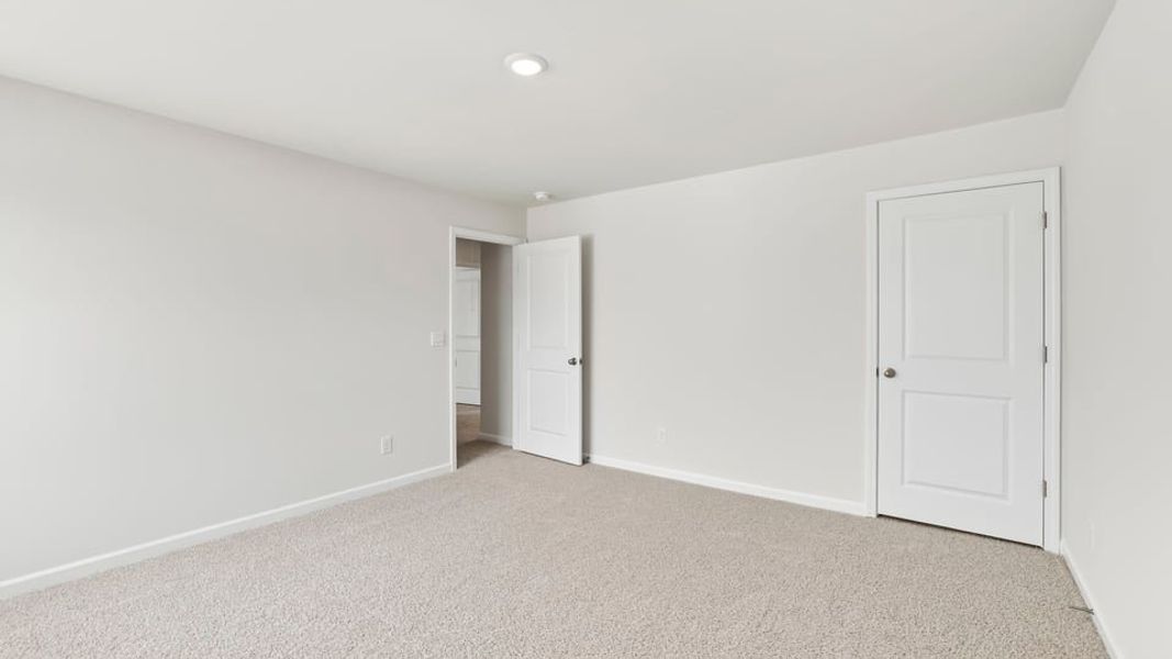 Spacious, unfurnished interior of a new home in Durbin Meadows Traditions, Fountain Inn (Image 32).