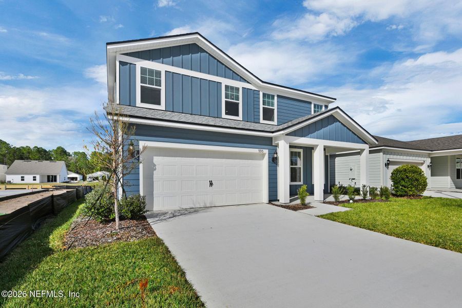 Front exterior of a new home in Hyland Trail, Green Cove Springs, FL, highlighting curb appeal (Image 20).