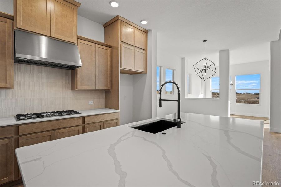 Furnished interior view inside a new home in Wolf Ranch - Enclave Collection, Colorado Springs (Image 5).
