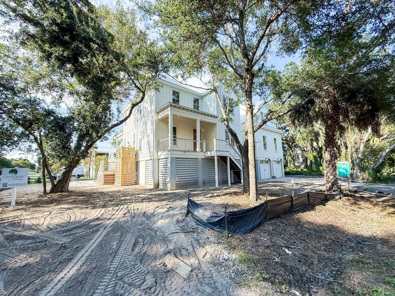 Front exterior of a new home in , Isle Of Palms, SC, highlighting curb appeal (Image 30). Front exterior of a new home in , Isle Of Palms, SC, highlighting curb appeal (Image 30).