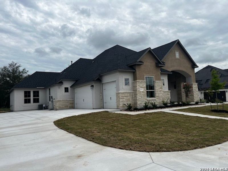 Front exterior of a new home in , San Antonio, TX, highlighting curb appeal (Image 1). Front exterior of a new home in , San Antonio, TX, highlighting curb appeal (Image 1).