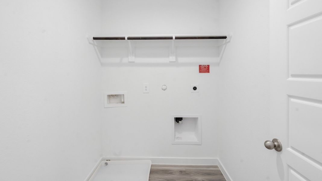 Representative furnished interior of a home built from the Jasmine by D.R. Horton in Grand West, Houston (Image 14).