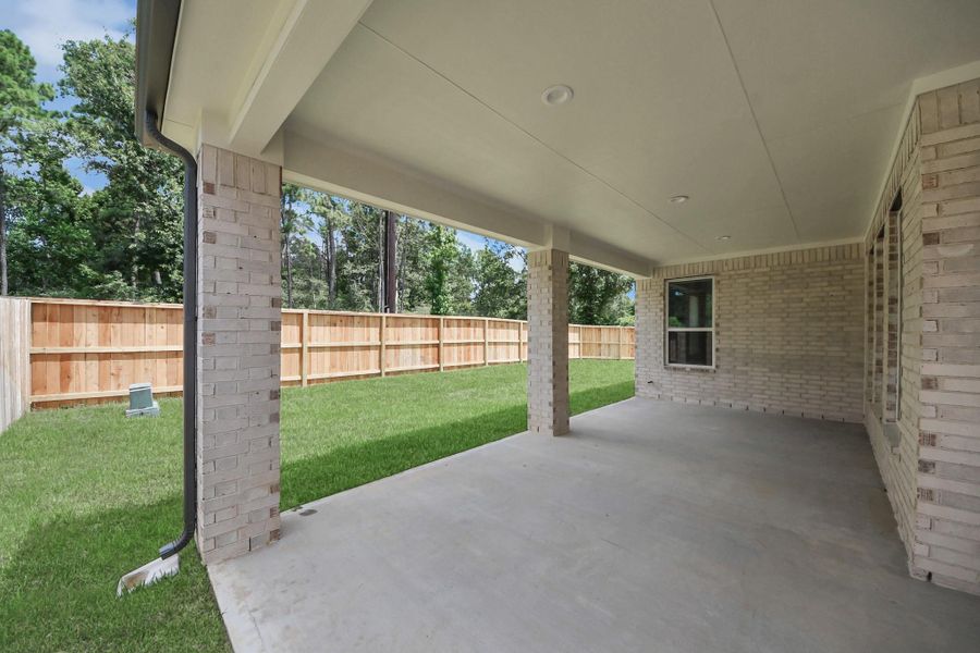 Experience outdoor living at its finest on this expansive covered patio, thoughtfully designed for BBQs and delightful outdoor dining. Experience outdoor living at its finest on this expansive covered patio, thoughtfully designed for BBQs and delightful outdoor dining.