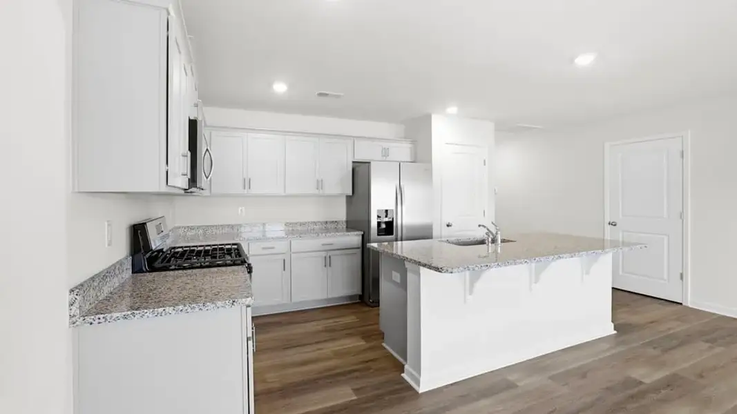 Furnished interior view inside a new home in Waverly Station, Greenwood (Image 10).