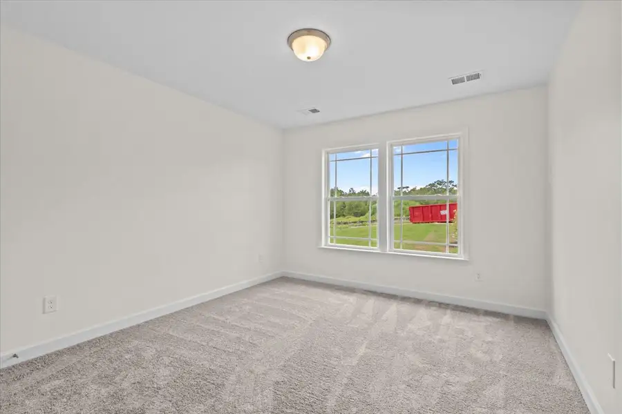Representative unfurnished interior of a home built from the Drayton by Enchanted Homes in Lonesome Dove, San Antonio (Image 15).