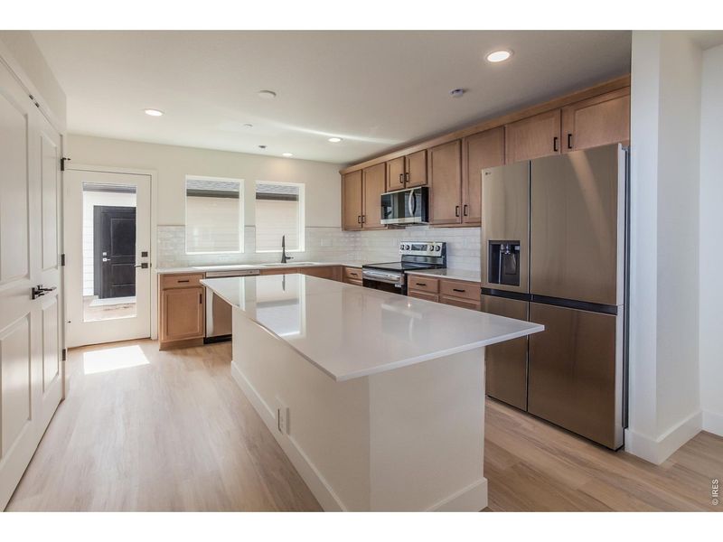 Furnished interior view inside a new home in Prairie Song Story Collection - Single Family Homes, Windsor (Image 12).