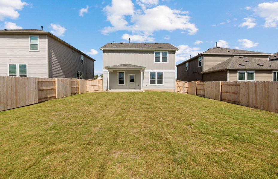 Exterior details and patio area of a home in Patterson Ranch, Georgetown (Image 17).