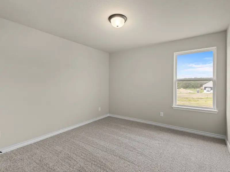 Spacious, unfurnished interior of a new home in The Reserve at Potranco Oaks, Castroville (Image 43).