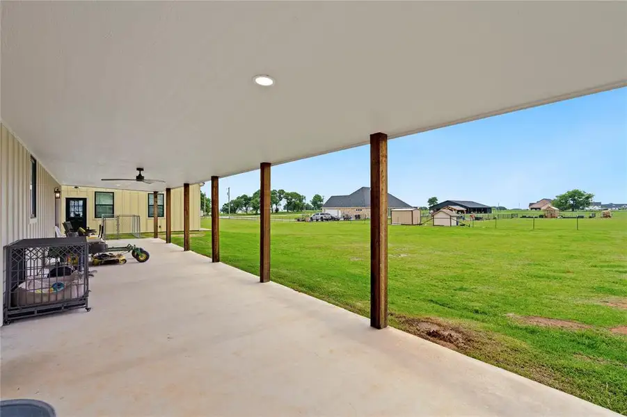 Exterior details and patio area of a home in , Tolar (Image 19).