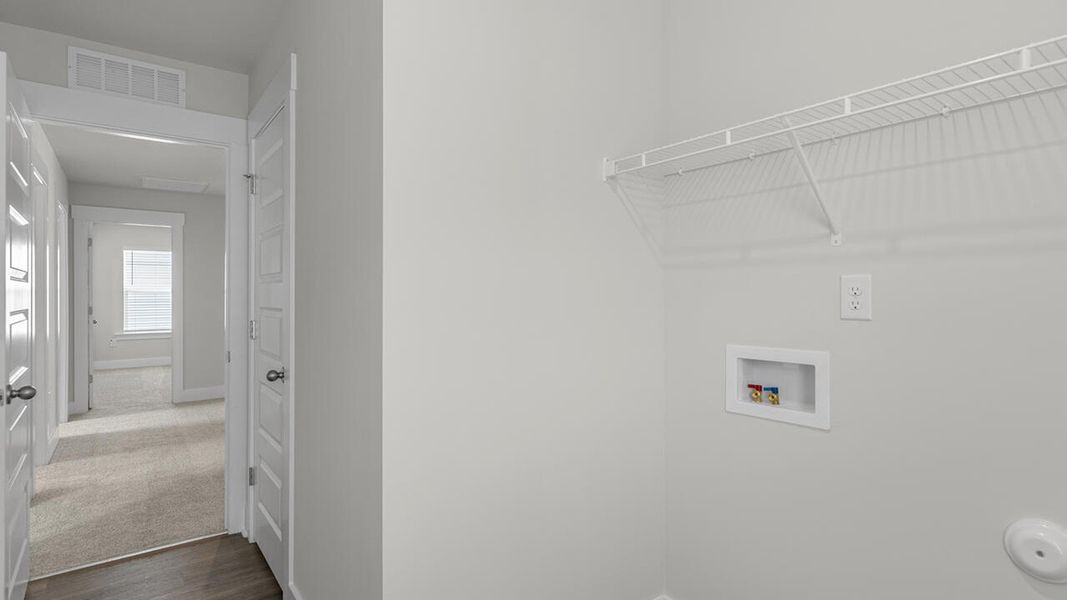 Spacious, unfurnished interior of a new home in Surfside Landing, Hubert (Image 41).