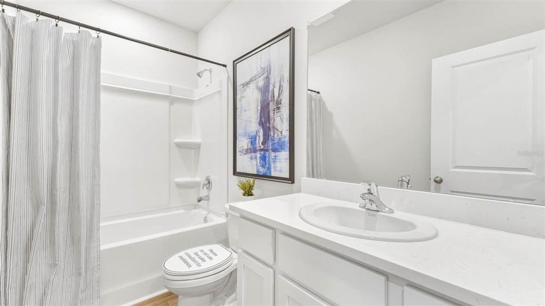 Furnished interior view inside a new home in Oasis at Longwood Run, Sarasota (Image 6).