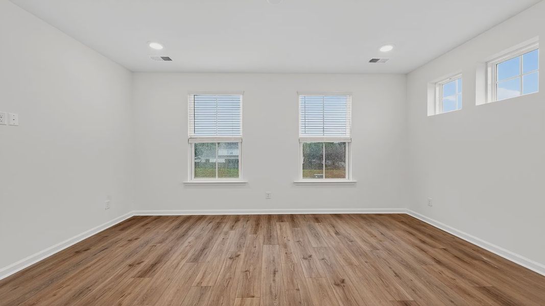 Furnished interior view inside a new home in Clear Springs Townhomes, North Charleston (Image 8).