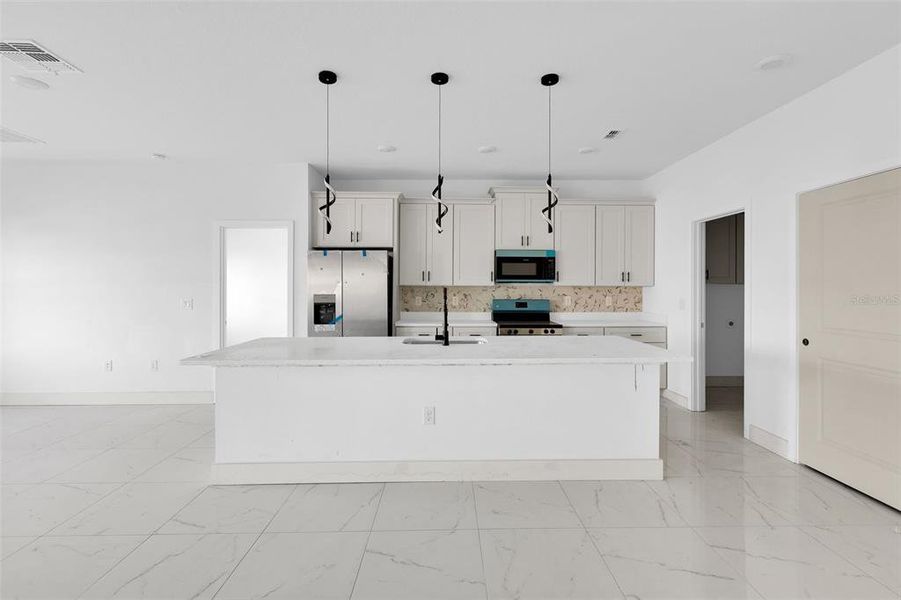 Furnished interior view inside a new home in , Port Charlotte (Image 5). Furnished interior view inside a new home in , Port Charlotte (Image 5).