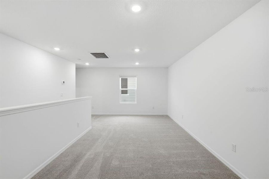 Spacious, unfurnished interior of a new home in Waterstone, Groveland (Image 39).