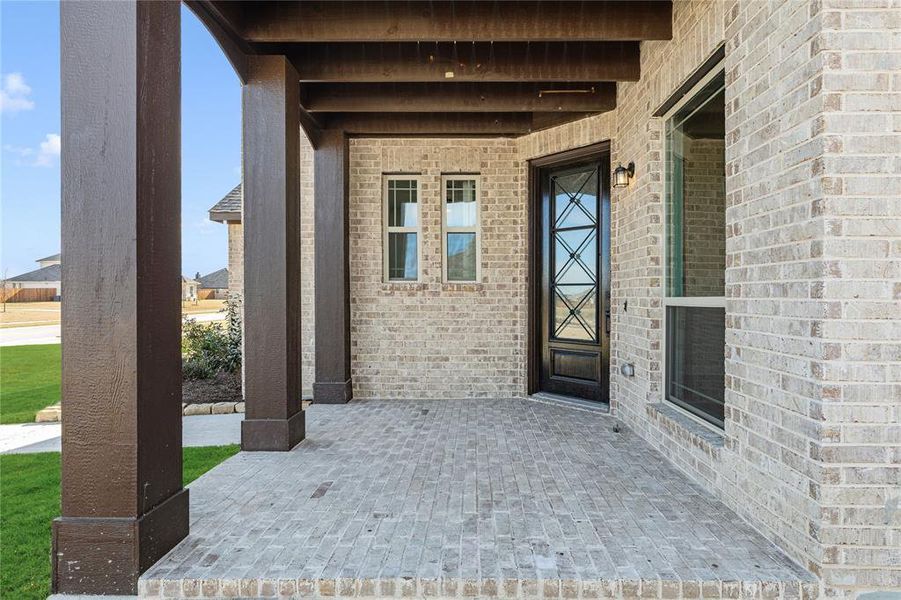 Exterior details and patio area of a home in Crystal Lake Estates, Red Oak (Image 3).