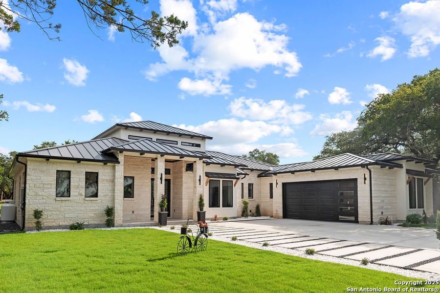 Front exterior of a new home in , Canyon Lake, TX, highlighting curb appeal (Image 14). Front exterior of a new home in , Canyon Lake, TX, highlighting curb appeal (Image 14).