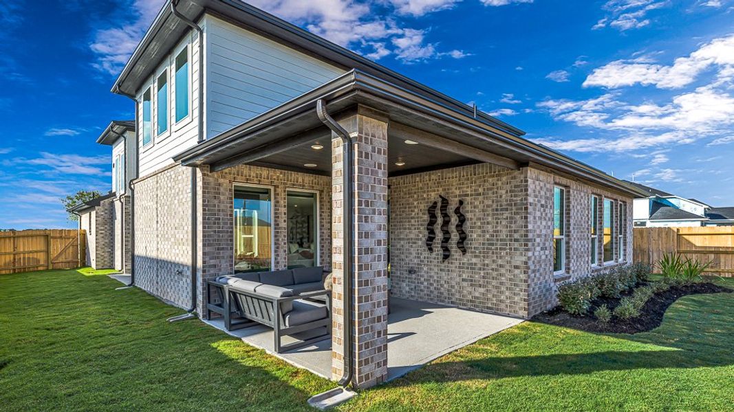 Exterior details and patio area of a home in Avalon at Cypress, Cypress (Image 22).