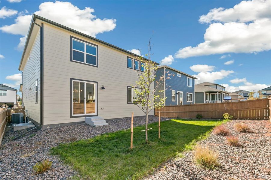 Exterior details and patio area of a home in Sunstone Village at Terrain, Castle Rock (Image 3). Exterior details and patio area of a home in Sunstone Village at Terrain, Castle Rock (Image 3).