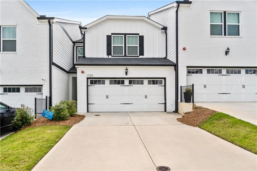 Front exterior of a new home in , Mableton, GA, highlighting curb appeal (Image 2).