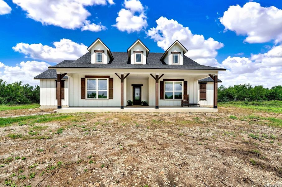 Front exterior of a new home in , Castroville, TX, highlighting curb appeal (Image 2). Front exterior of a new home in , Castroville, TX, highlighting curb appeal (Image 2).