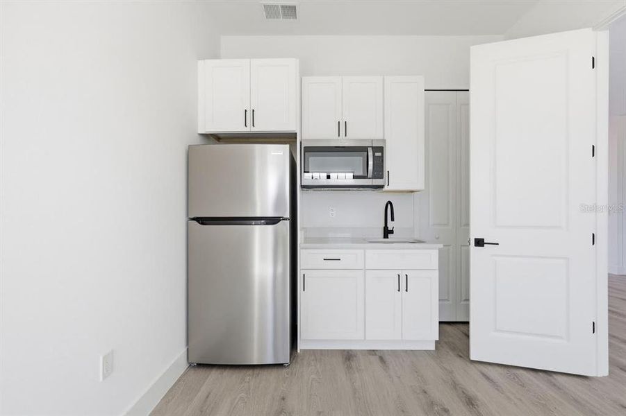 Furnished interior view inside a new home in , Ocala (Image 19). Furnished interior view inside a new home in , Ocala (Image 19).