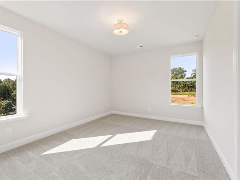 Spacious, unfurnished interior of a new home in Melody Lakeside Estates, Buford (Image 13).