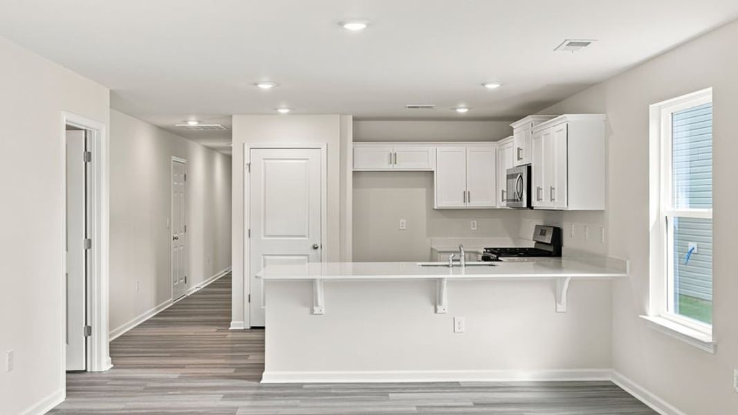 Furnished interior view inside a new home in Tyger Pines, Moore (Image 5).