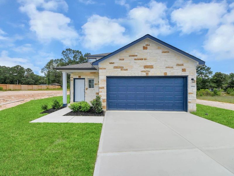 Front exterior of a new home in Liberty Estates, Cleveland, TX, highlighting curb appeal (Image 2). Front exterior of a new home in Liberty Estates, Cleveland, TX, highlighting curb appeal (Image 2).