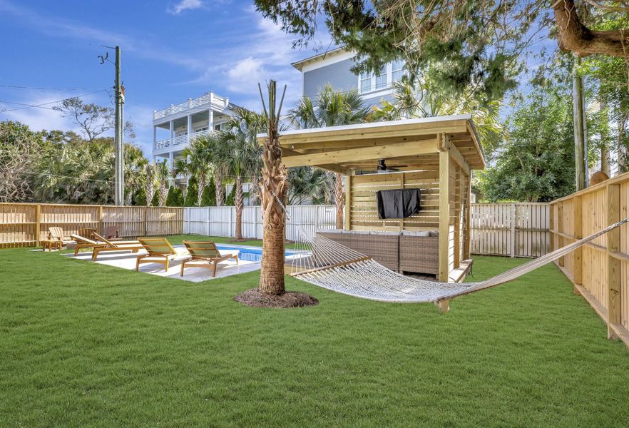 Exterior details and patio area of a home in , Isle Of Palms (Image 24).