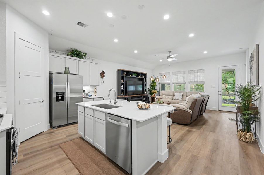 Kitchen open to family room making for effortless entertaining. Kitchen open to family room making for effortless entertaining.