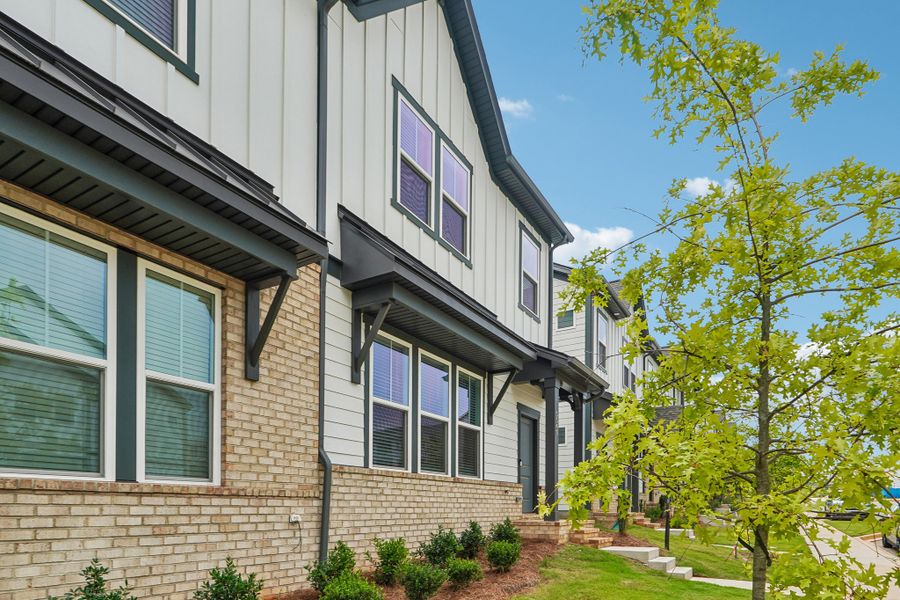 Exterior details and patio area of a home in Terraces at the Exchange, Indian Land (Image 23).