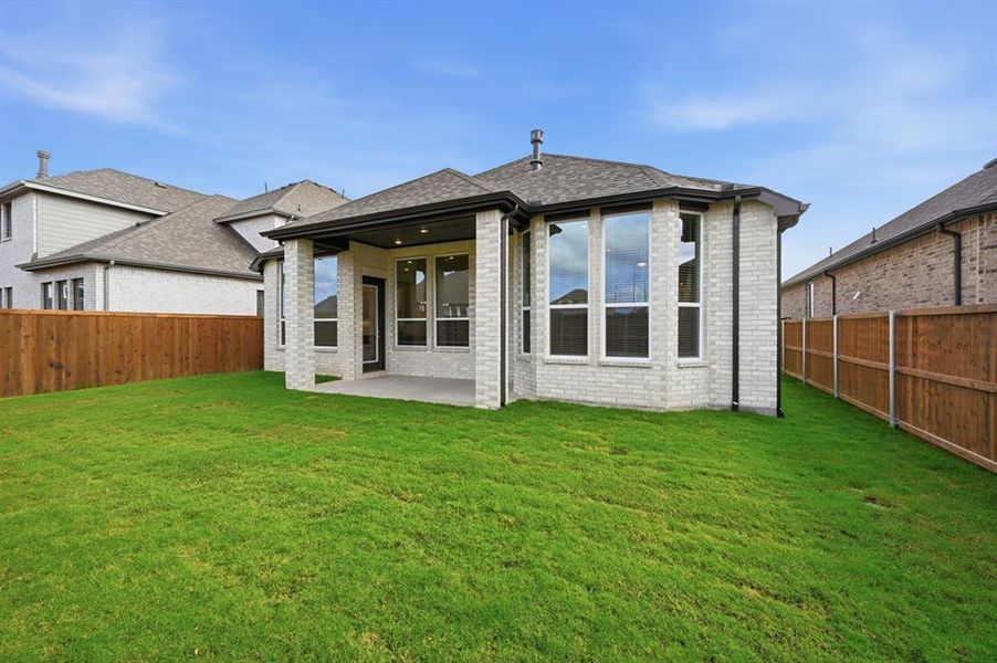 Exterior details and patio area of a home in Wellington: Artisan Series - 50ft lots, Haslet (Image 3).