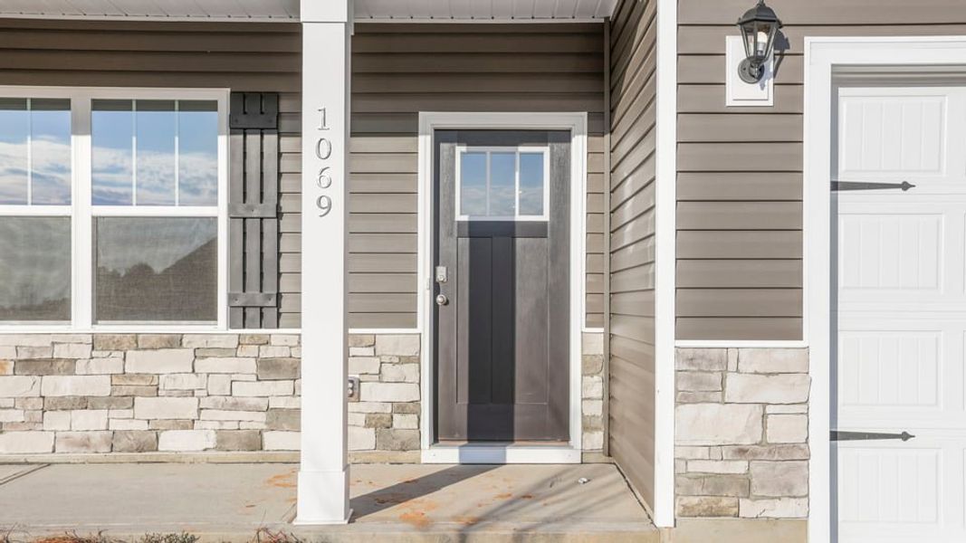 Exterior details and patio area of a home in Hunters Ridge, Woodruff (Image 3).