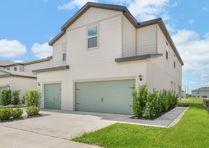 You will love the professional landscaping of the Destin plan.