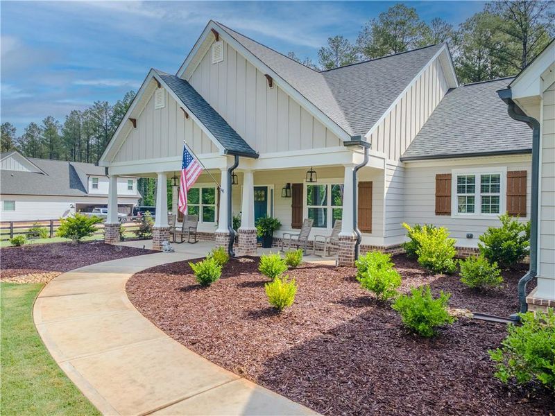 Front exterior of a new home in , Good Hope, GA, highlighting curb appeal (Image 25).