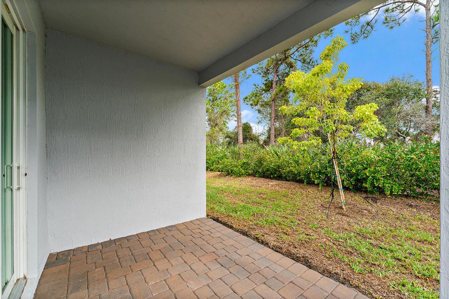 Exterior details and patio area of a home in Banyan Bay, Stuart (Image 41).
