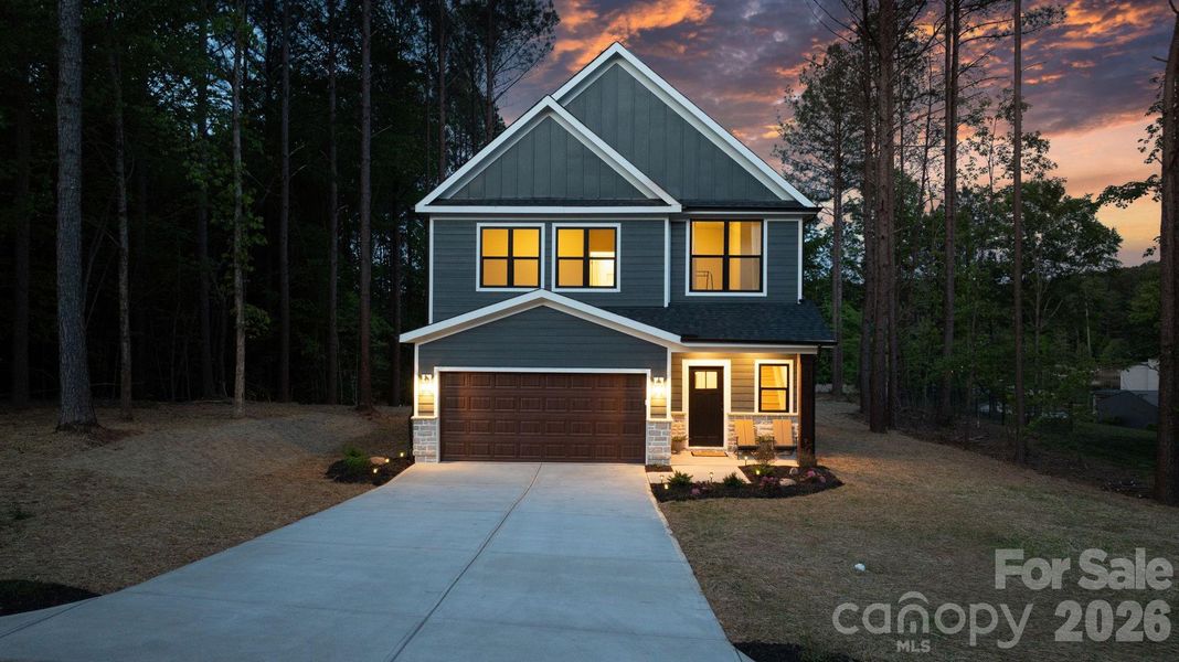 Front exterior of a new home in , Hickory, NC, highlighting curb appeal (Image 28).