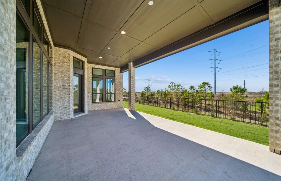 Exterior details and patio area of a home in Bridgeland 60′, Cypress (Image 3).
