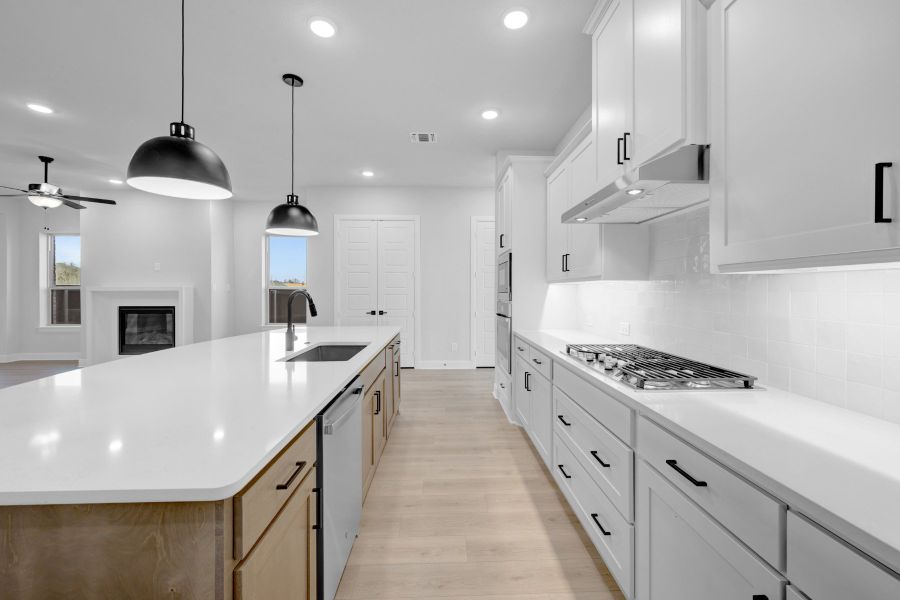 Furnished interior view inside a new home in Elements at Viridian - Traditional Series, Arlington (Image 6). Furnished interior view inside a new home in Elements at Viridian - Traditional Series, Arlington (Image 6).