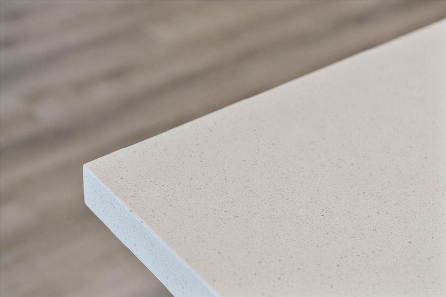 Enjoy the beauty of quartz, featuring a clean, eased edge profile and contemporary soft tones.