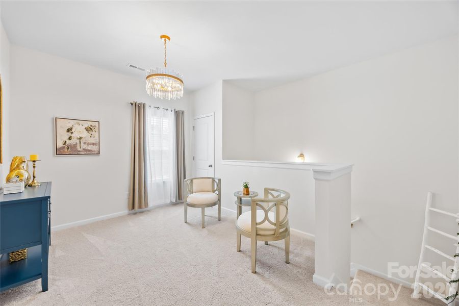 Furnished interior view inside a new home in Orchard Creek, Charlotte (Image 15).
