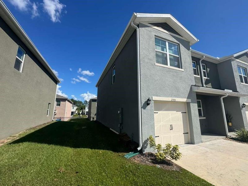 Exterior details and patio area of a home in , Davenport (Image 1).