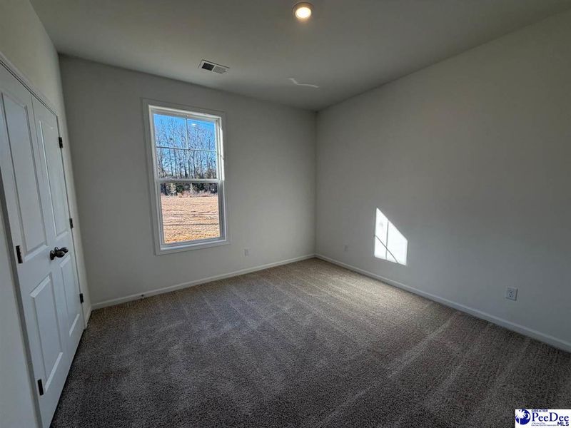 Spacious, unfurnished interior of a new home in The Grove, Florence (Image 12).