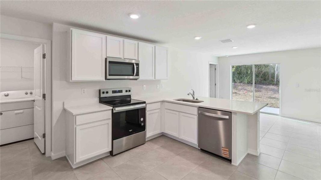 Furnished interior view inside a new home in Triumph South, Wildwood (Image 6). Furnished interior view inside a new home in Triumph South, Wildwood (Image 6).